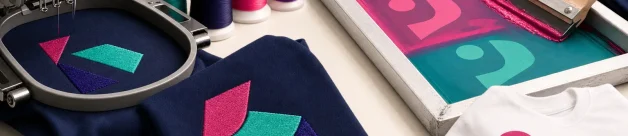 Embroidery machine and screen printing tools showing stitched and printed decoration