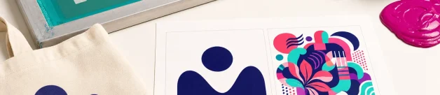 Screen printing setup showing simple artwork and complex full color artwork samples